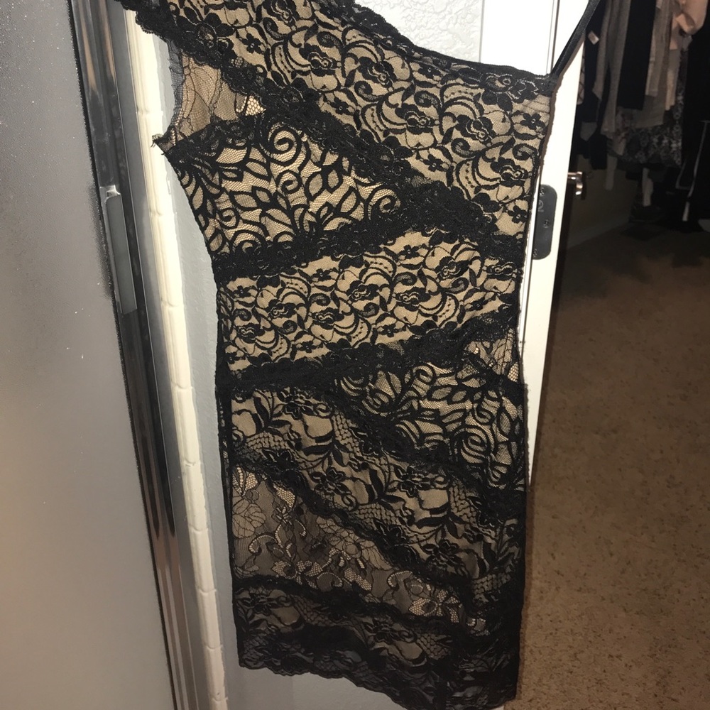 BEBE laced one shoulder black and beige.  Size xs